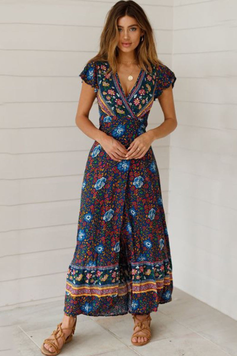 Woman wearing Bohemian floral print wrap dress with V-neck and ruffle skirt