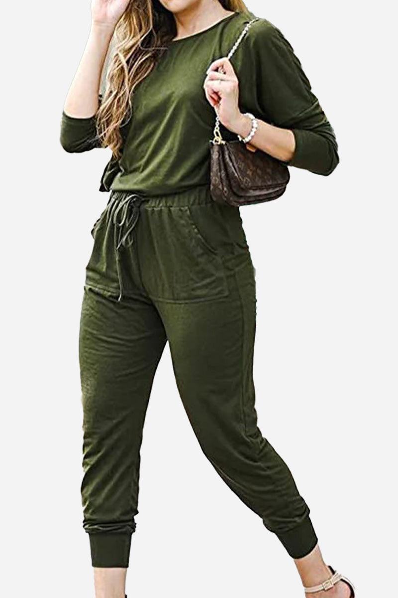 woman wearing cozy chic two-piece sweatsuit set with long-sleeve top and pants with pockets