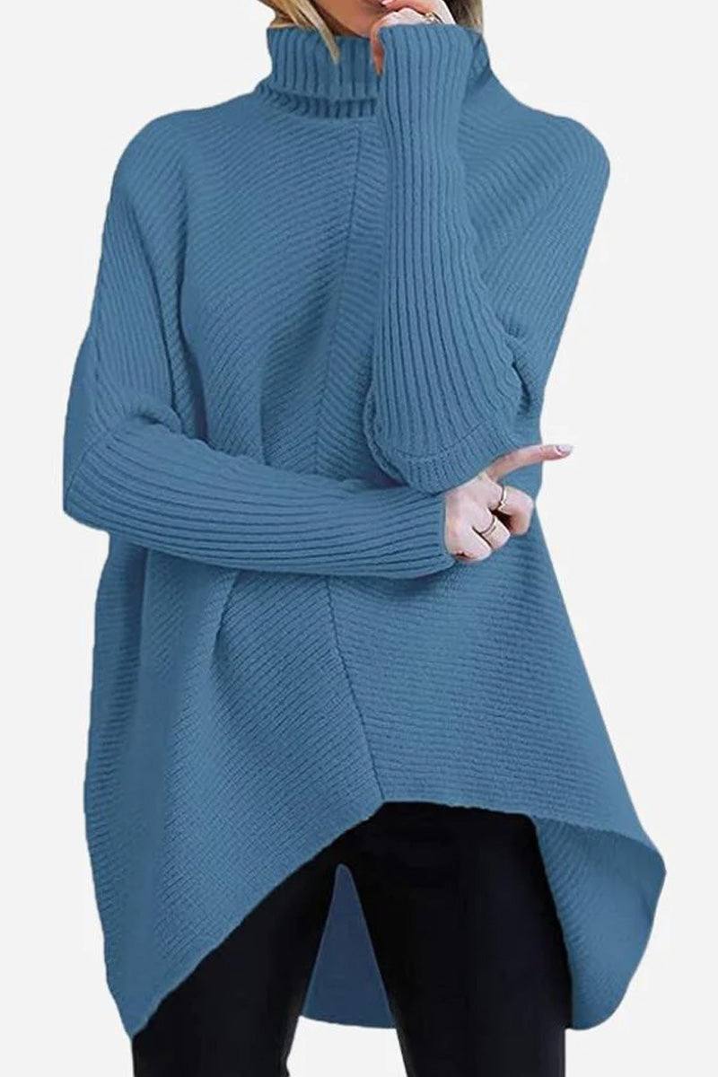 Blue cozy oversized knit pullover with high neck and long sleeves on model