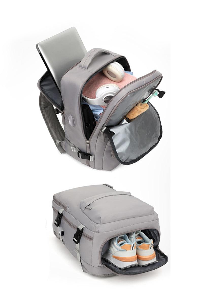 Chic Wanderlust Waterproof Backpack in gray with spacious compartments for laptop, headphones, camera, and separate shoe storage compartment.