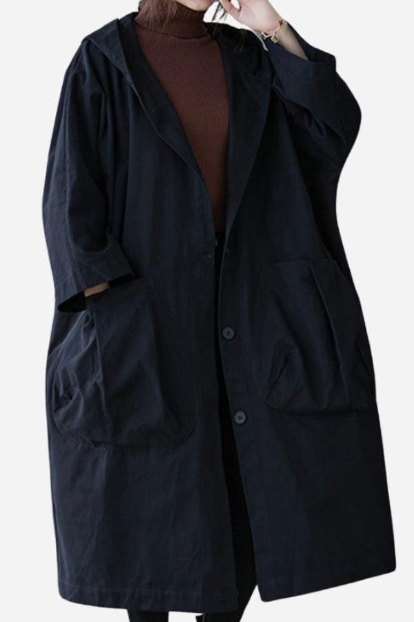 Black oversized water resistant windbreaker jacket with pockets and button closure