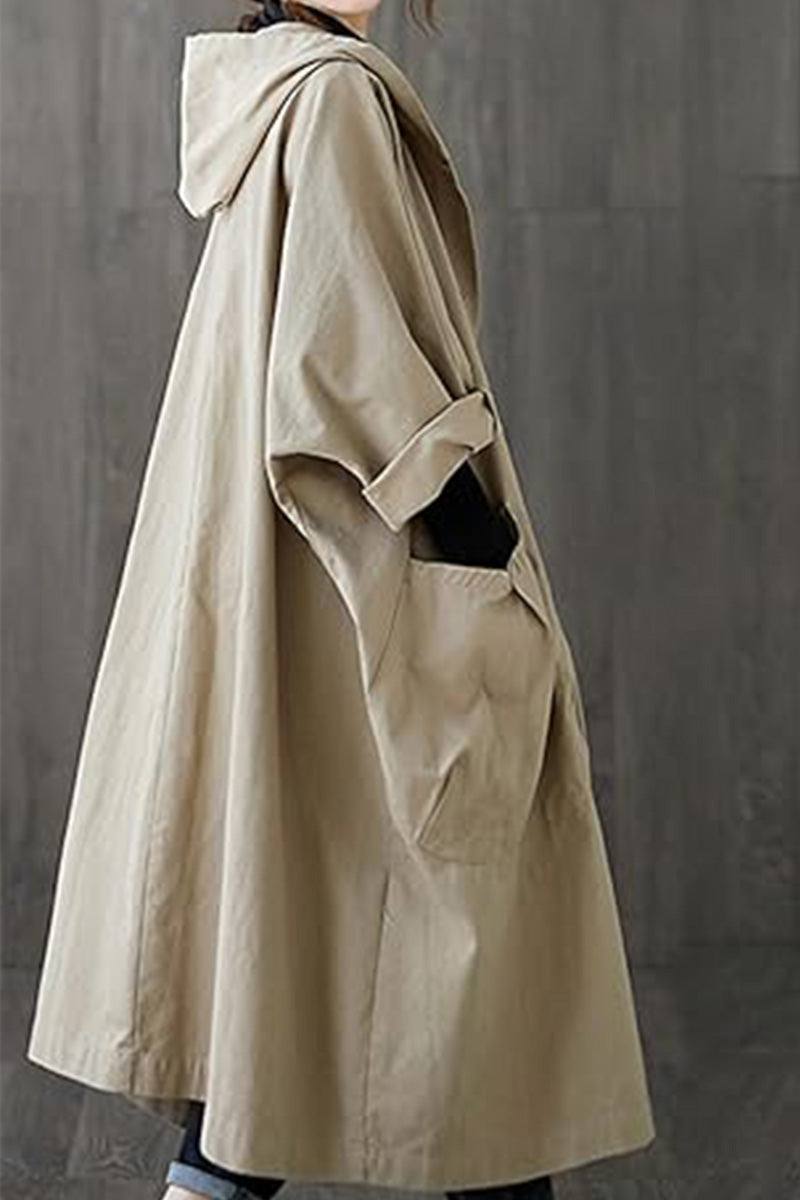 Oversized beige water resistant windbreaker jacket with hood and pockets for women