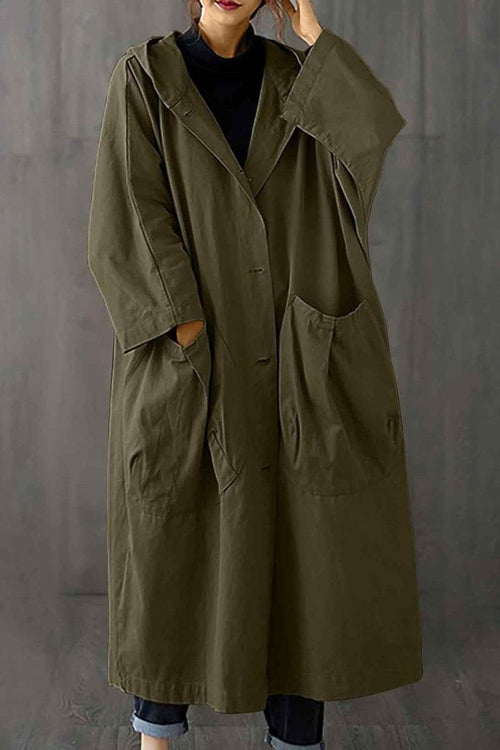 Oversized olive green water resistant windbreaker jacket with hood and pockets