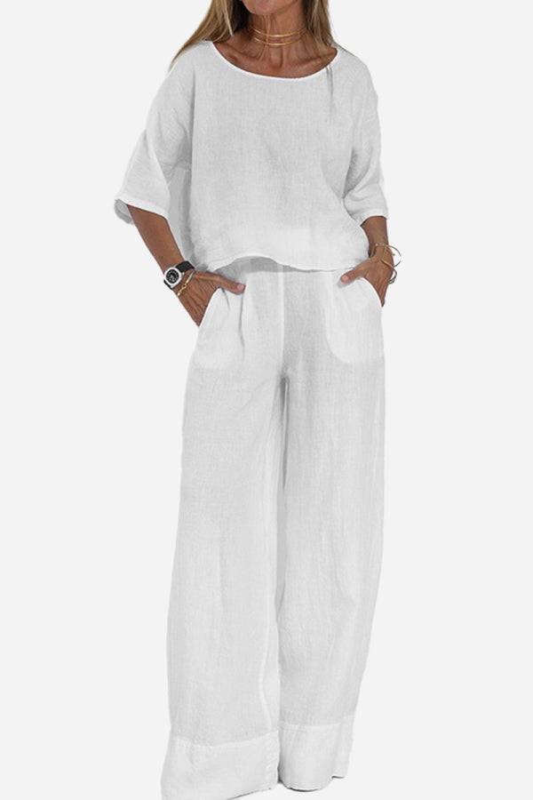 White short-sleeved pullover and wide trouser matching set with deep pockets and loose fit for casual comfort
