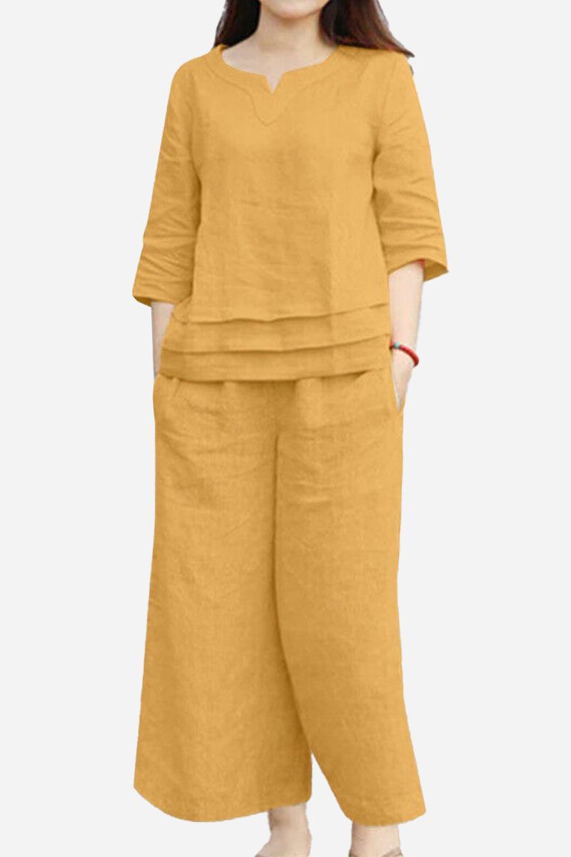 Women wearing mustard yellow cotton casual solid color pants set with relaxed fit