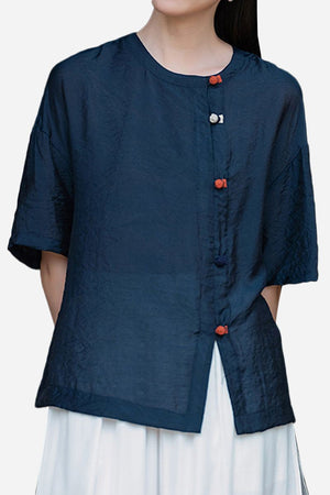Navy regenerated cellulose blouse with asymmetrical button design and oversized fit