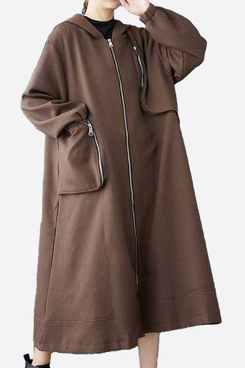 ZipLine Oversized Long Coat in brown waffle texture with large zippered pockets and hood, lightweight and travel-friendly design.