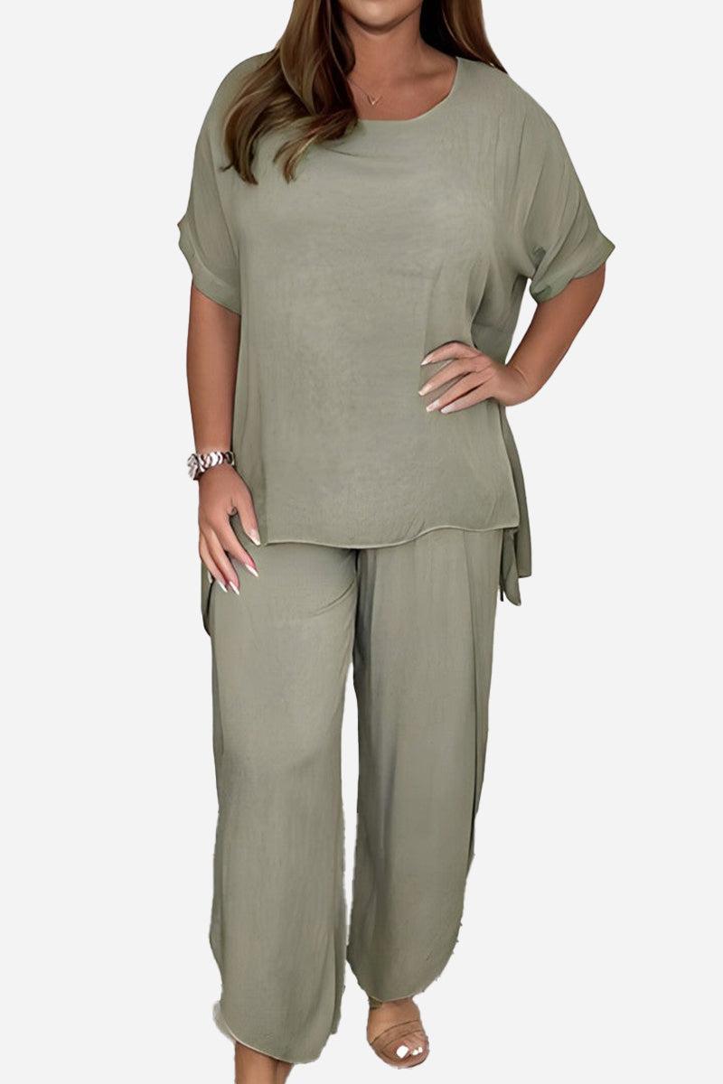 Relaxed linen-like travel two-piece set in soft olive green with loose fit top and pants, wrinkle-resistant and breathable for comfortable stylish travel wear