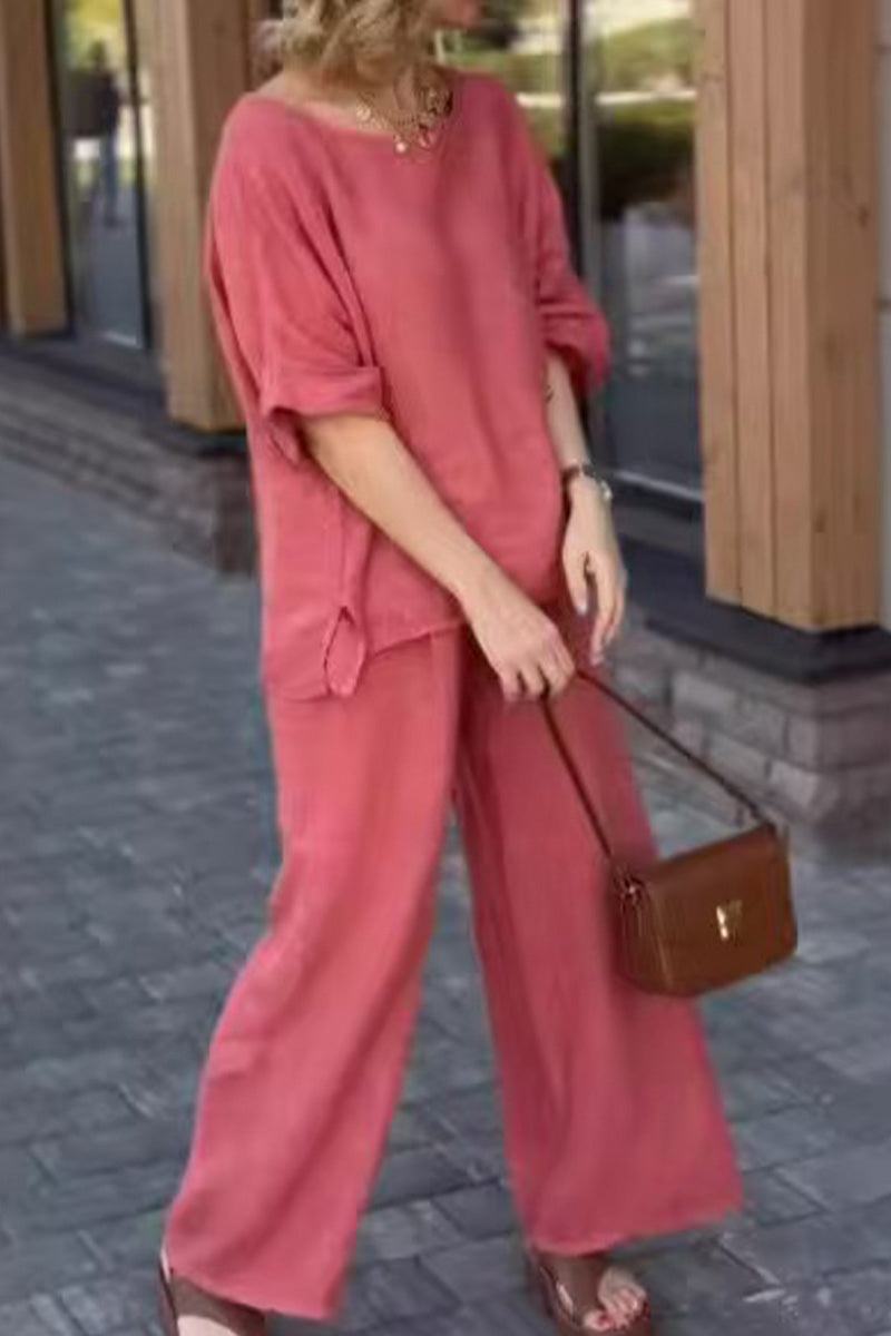 100 cotton two-piece set in coral pink with round neck top and wide-leg pants for casual comfort and style