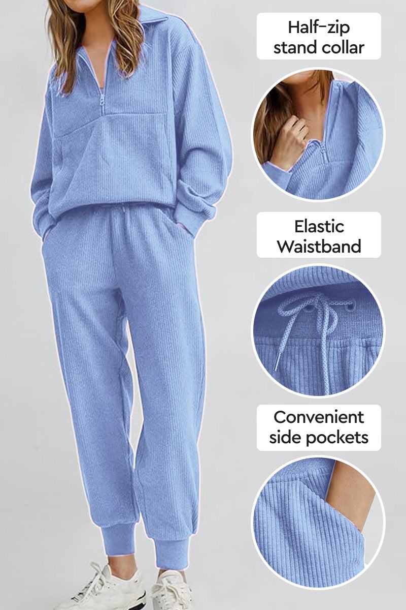 Unisex half-zip pullover and sweatpants set in light blue with stand collar, elastic waistband, and side pockets for casual comfort