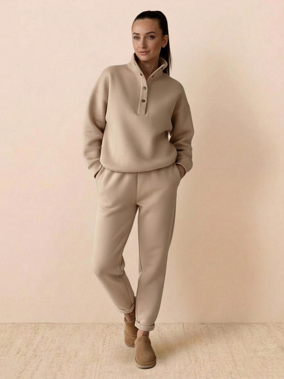 Woman wearing beige Warm & Easy two-piece set with button-collar pullover hoodie and matching pants