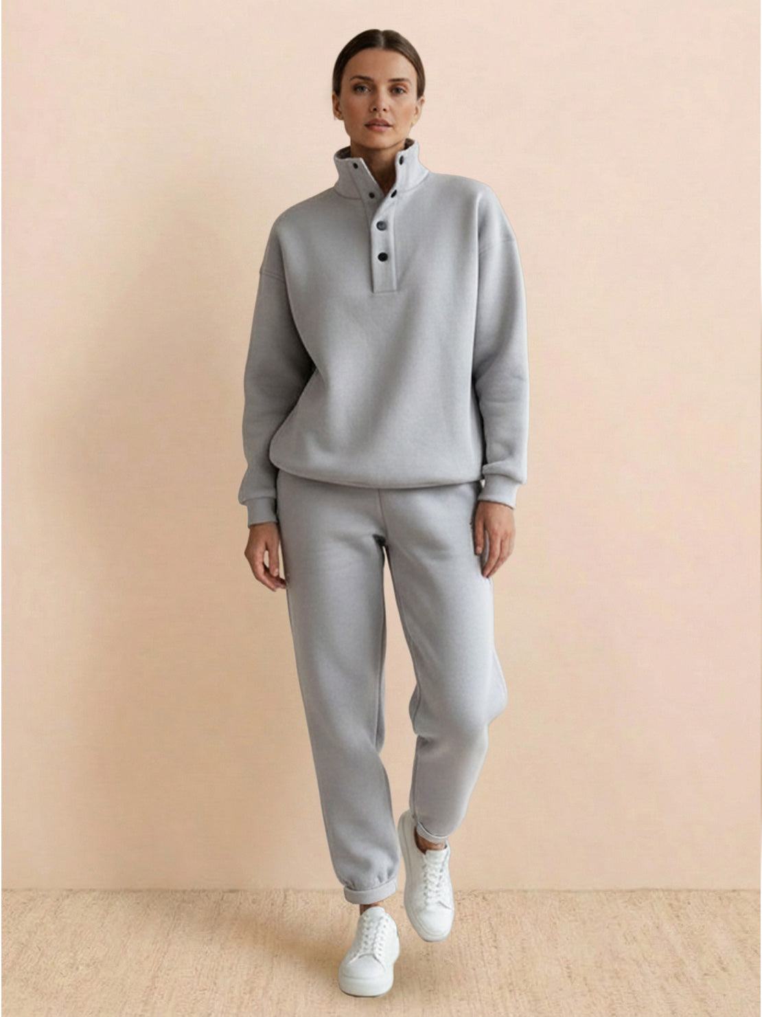 Woman wearing Warm & Easy Two-Piece Set in light gray with a relaxed fit and button-collar pullover hoodie.
