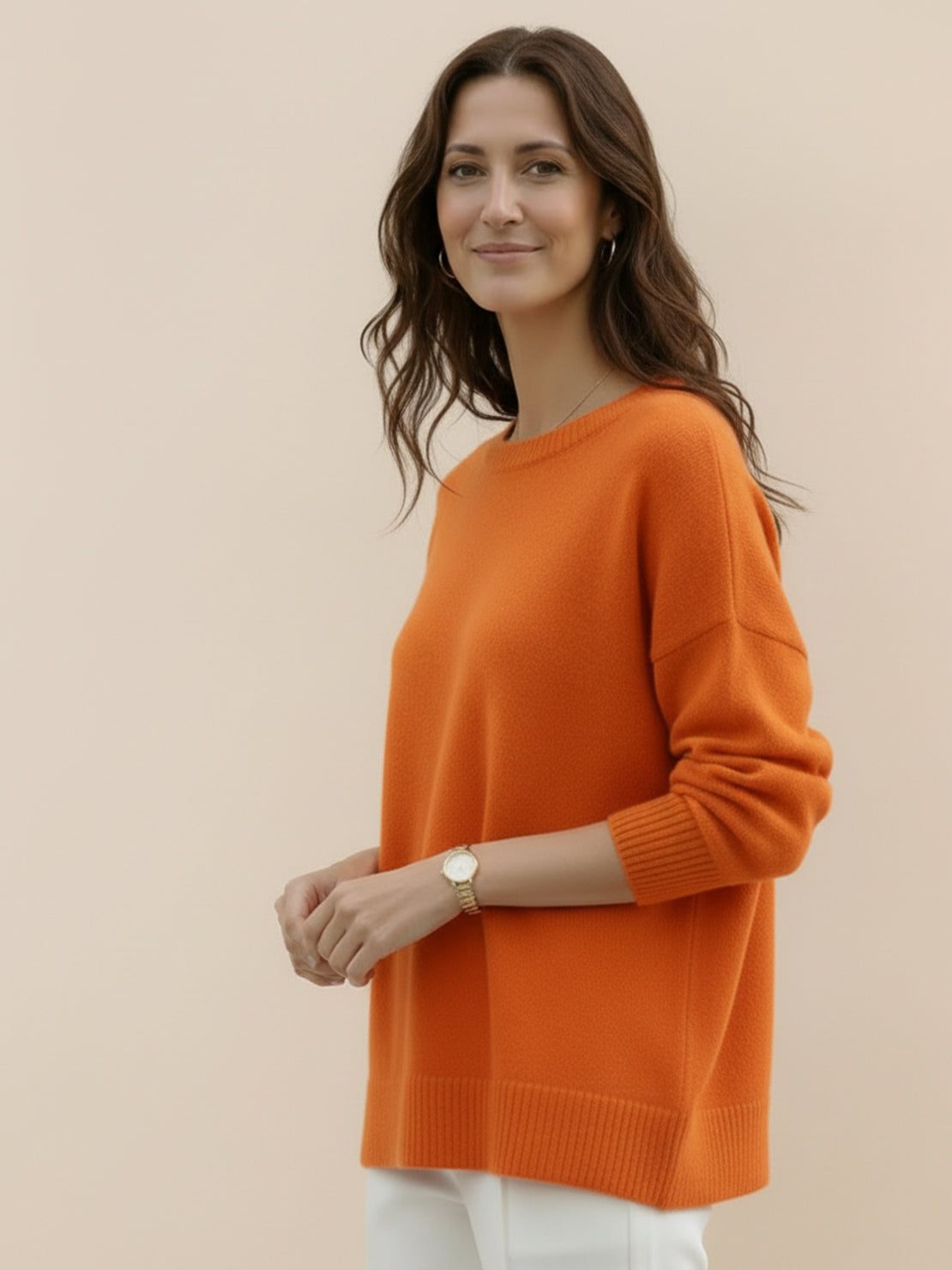 Oversized crew neck knit sweater with drop-shoulder sleeves and ribbed cuffs in neutral color