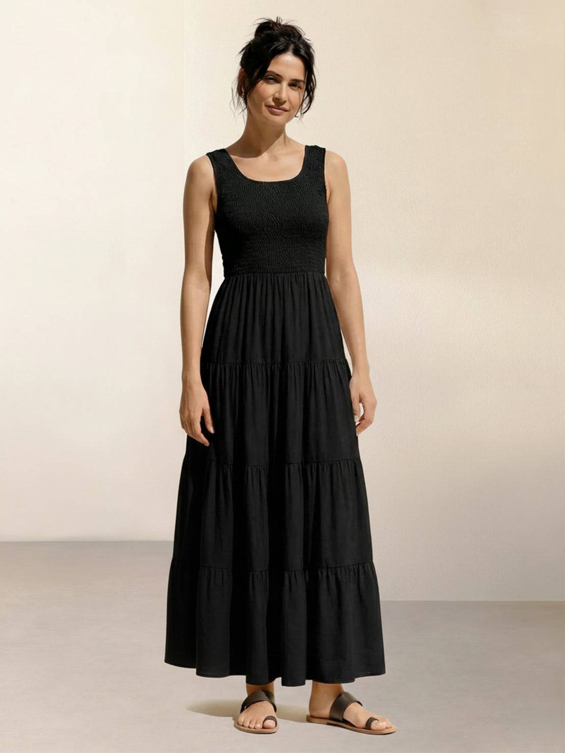 Smocked sleeveless maxi dress with tiered skirt and scoop neckline in lightweight fabric