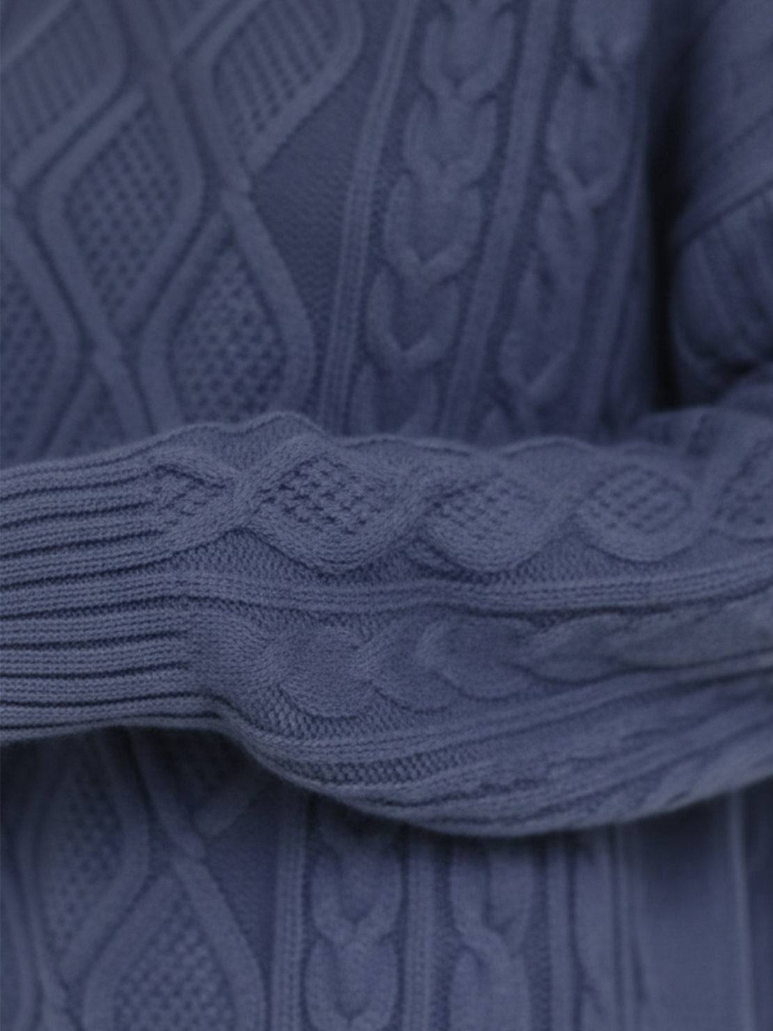 Oversized cable-knit crewneck sweater with dropped shoulders and ribbed trim in thick plush fabric