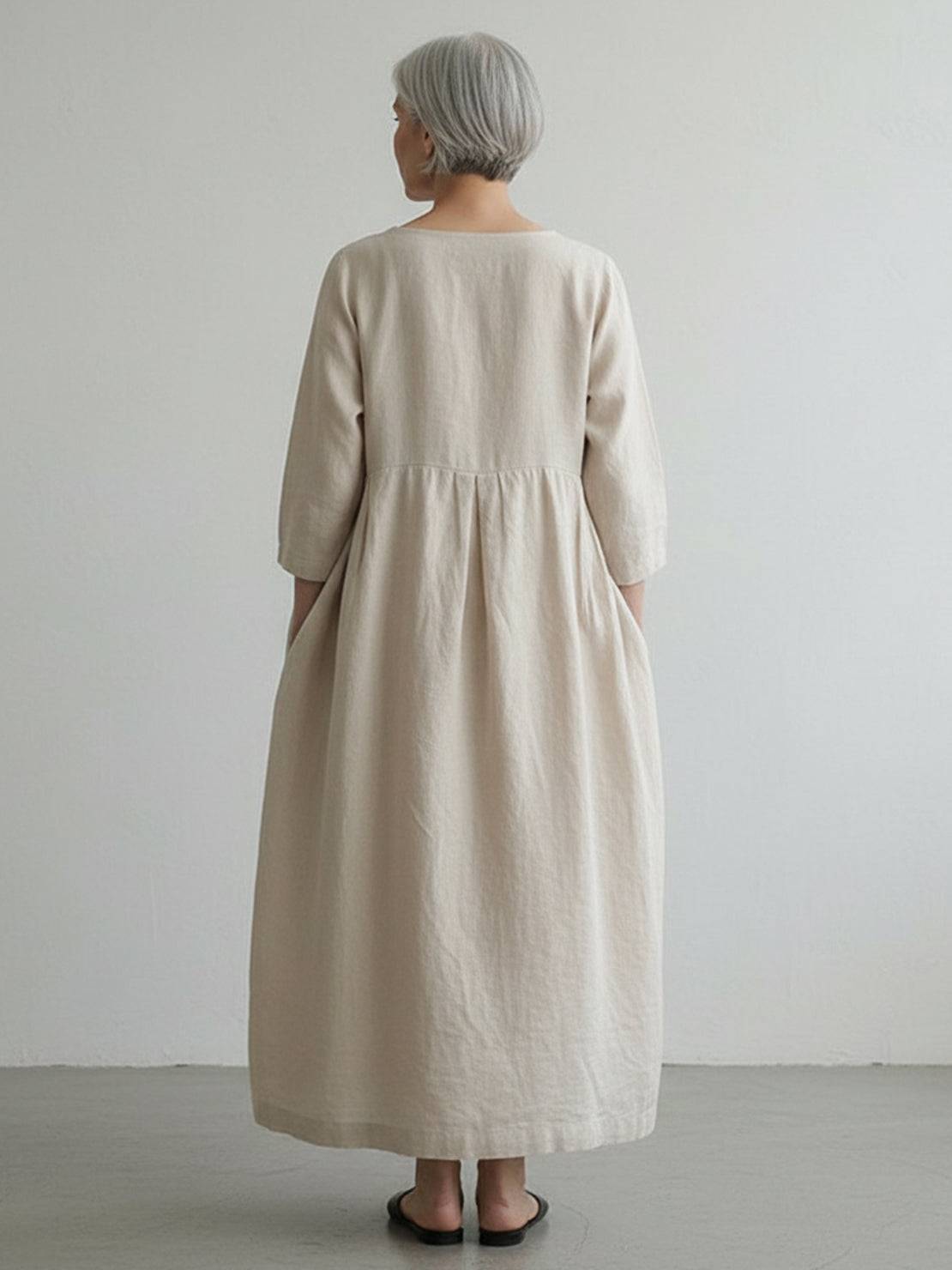 Maxi cotton-linen empire waist dress with A-line silhouette and 3/4 sleeves