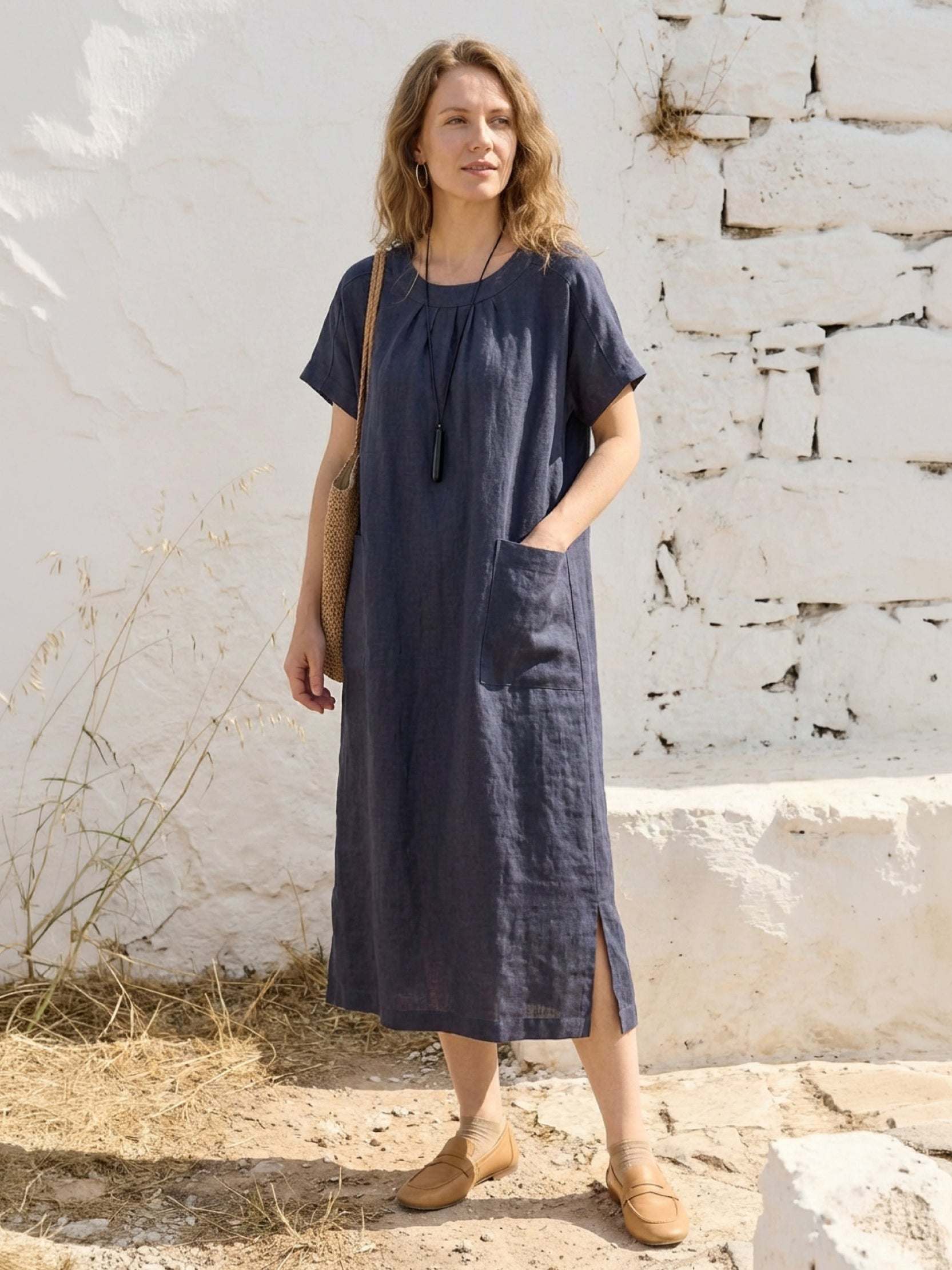 100% linen relaxed midi dress with short sleeves and front pockets