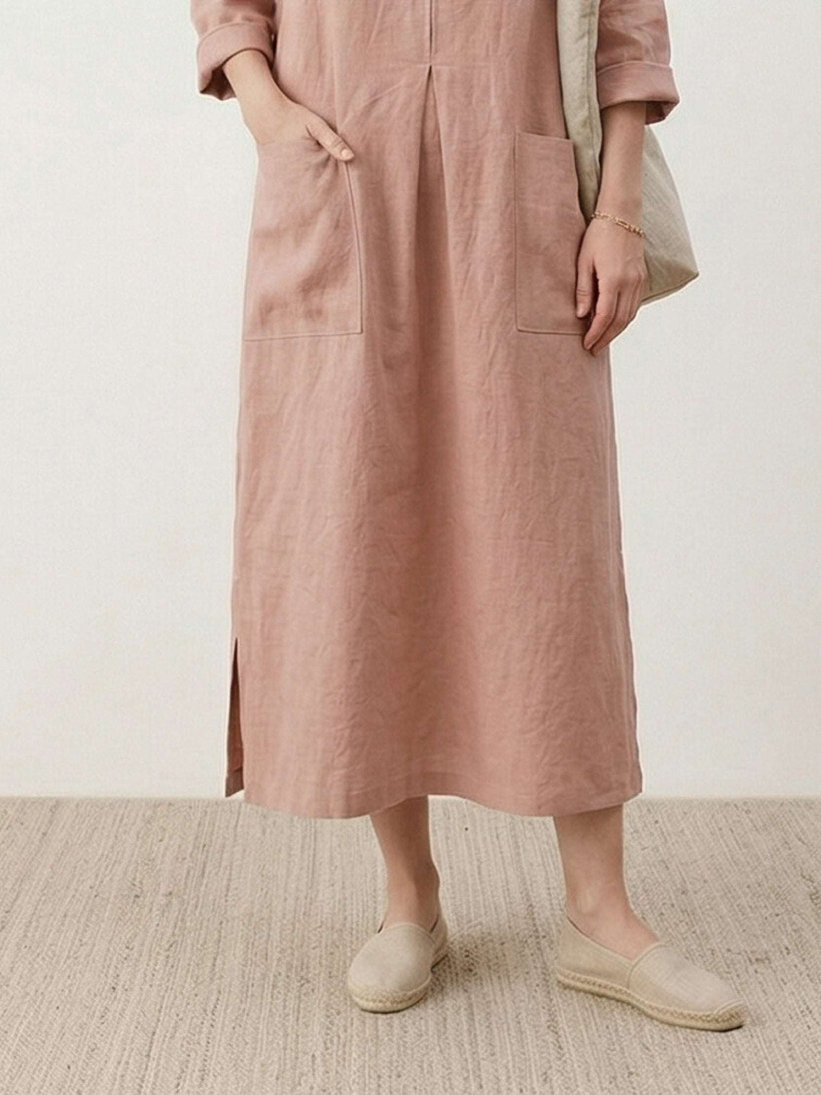 100% linen A-line maxi dress with 3/4 sleeves and large patch pockets