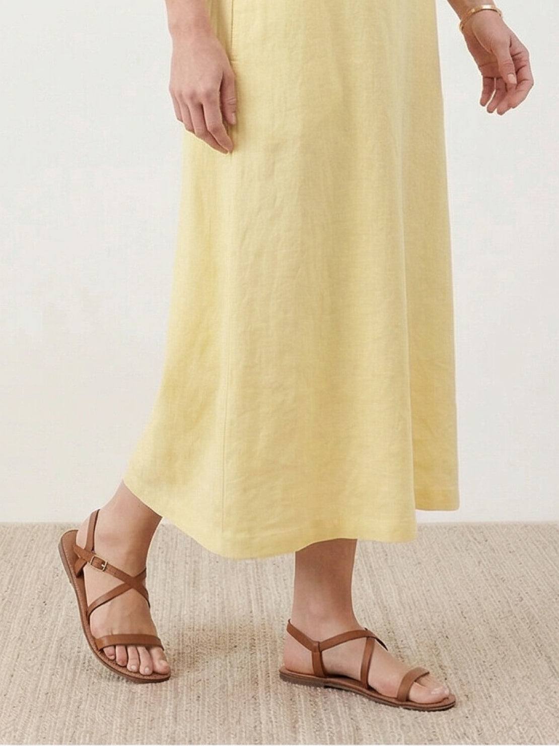 Lightweight cotton linen sleeveless maxi dress with round neckline and flowing ankle-length silhouette