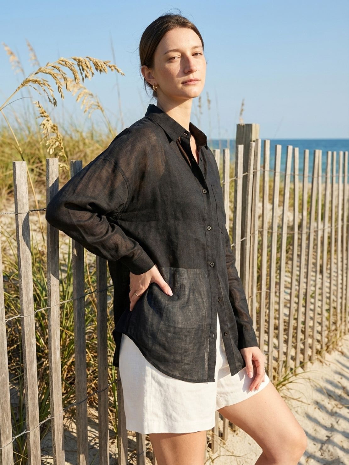 Lightweight 100% linen sheer overshirt with relaxed fit, button front, and dropped shoulders.
