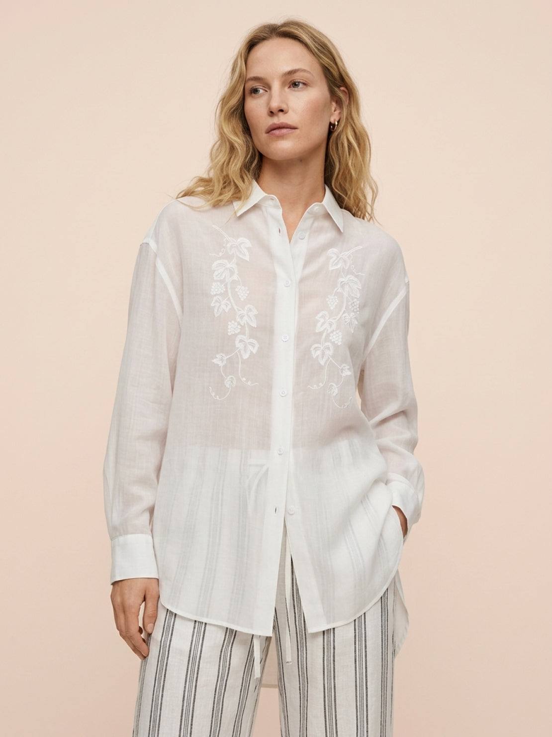 Ramie linen-lyocell blend embroidered tunic-length shirt with curved hem and floral details