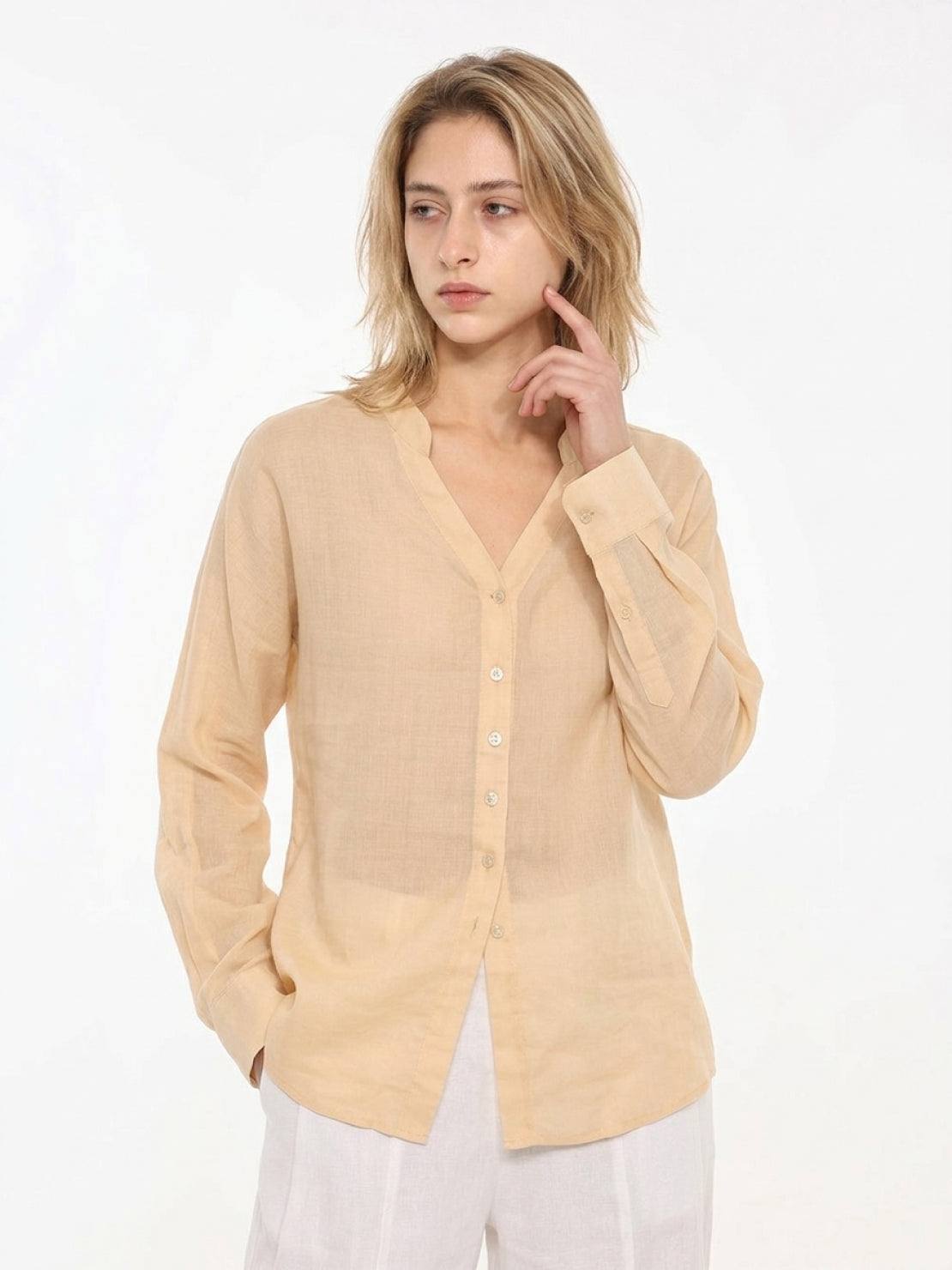 Loose fit 100% linen V-neck shirt with long sleeves and button cuffs