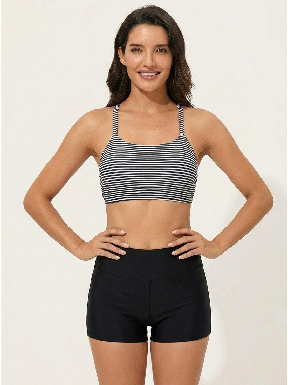 Three-piece open-back swim set with loose tank, racerback crop bra, and mid-rise boy shorts