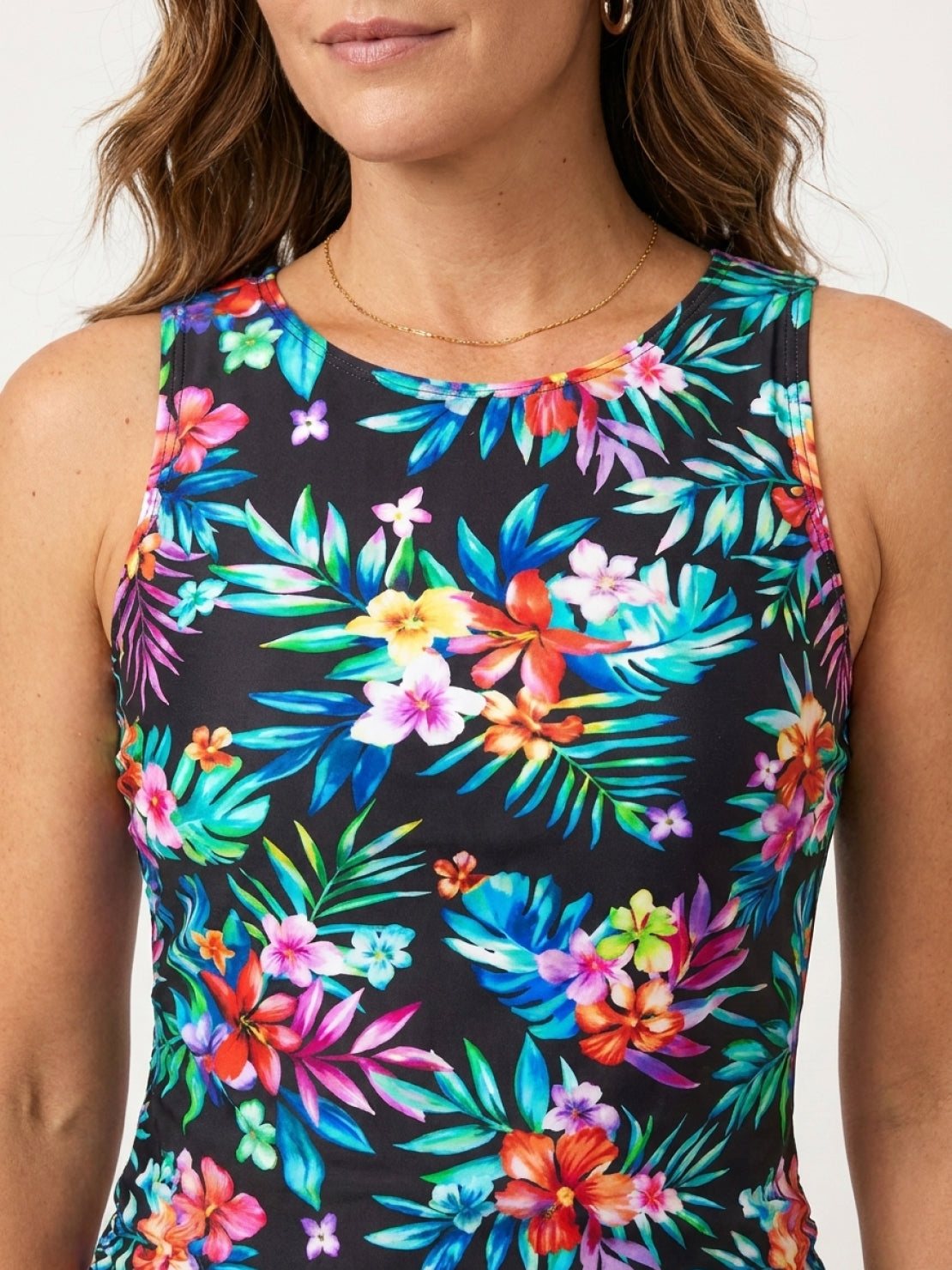 High-neck ruched tankini set with gathered side seams and built-in brief in swim skirt or shorts style