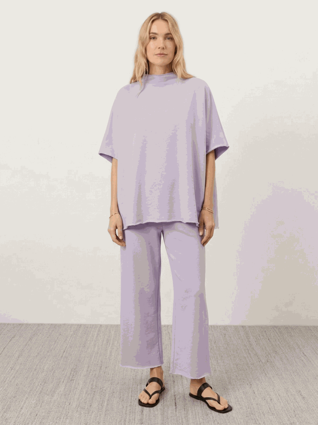 Cotton-blend capelet lounge set with mock neck batwing top and wide-leg pants in neutral tones