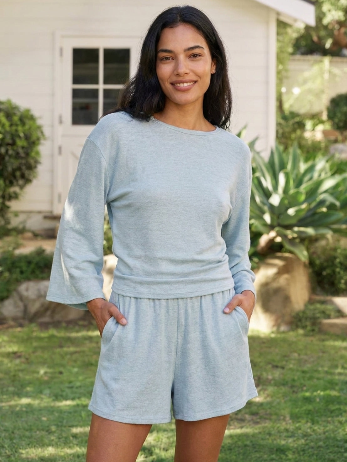 Light blue linen blend lounge set with fitted cropped top and ruched waist, styled for spring and summer comfort