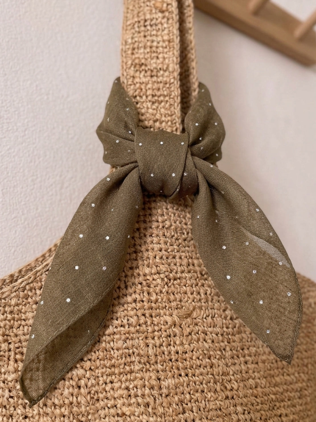 Lightweight 100% linen neck scarf with timeless checkered pattern and natural rolled edges