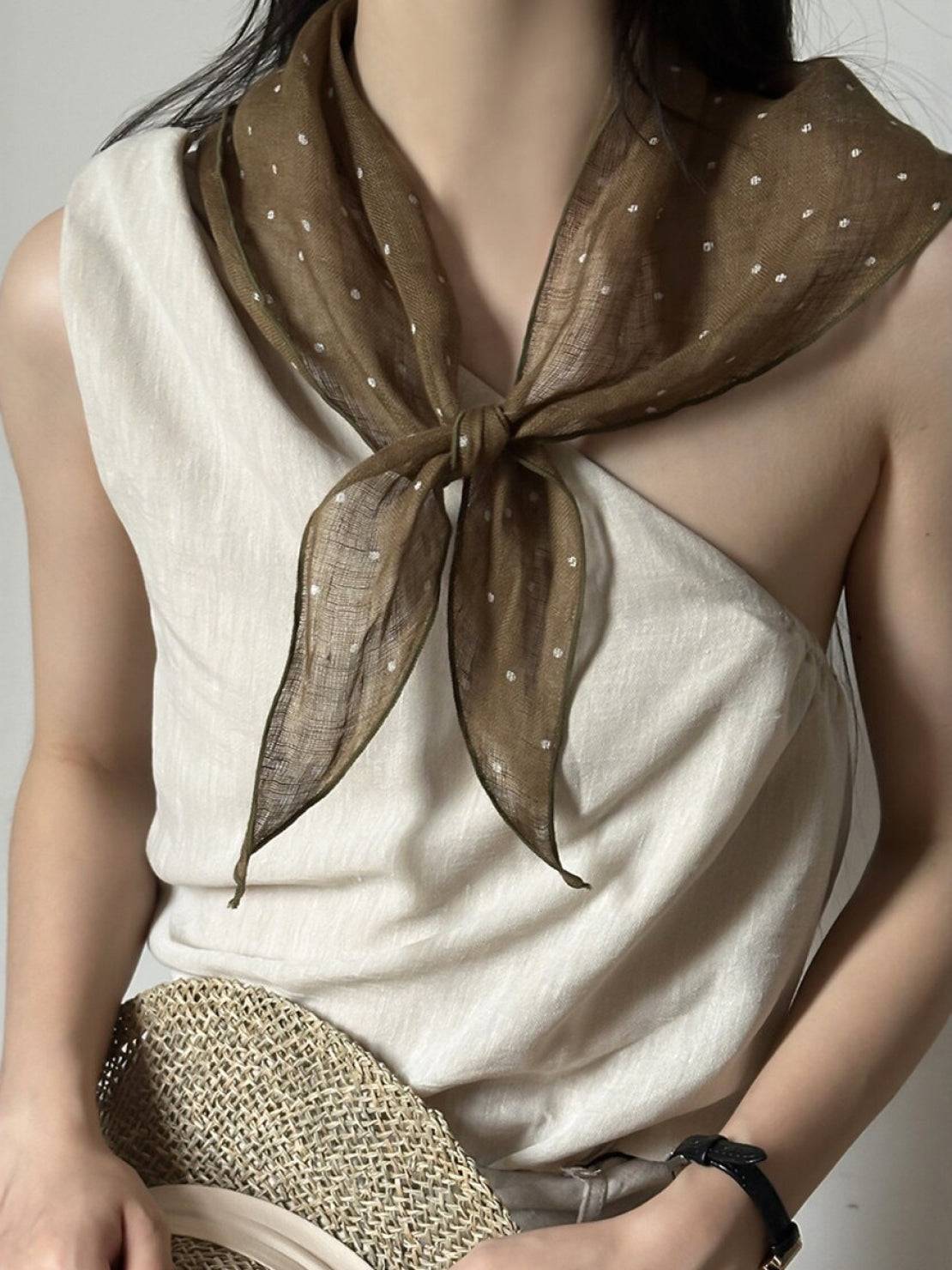 Lightweight 100% linen neck scarf with timeless checkered pattern and natural rolled edges for versatile styling