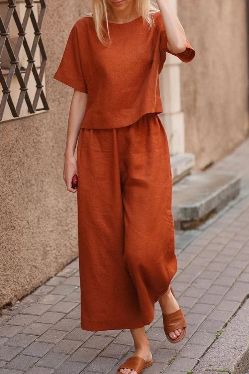 Breezy Meadow Two-Piece Set featuring soft-tailored top and wide-leg trousers in lightweight polyester fabric