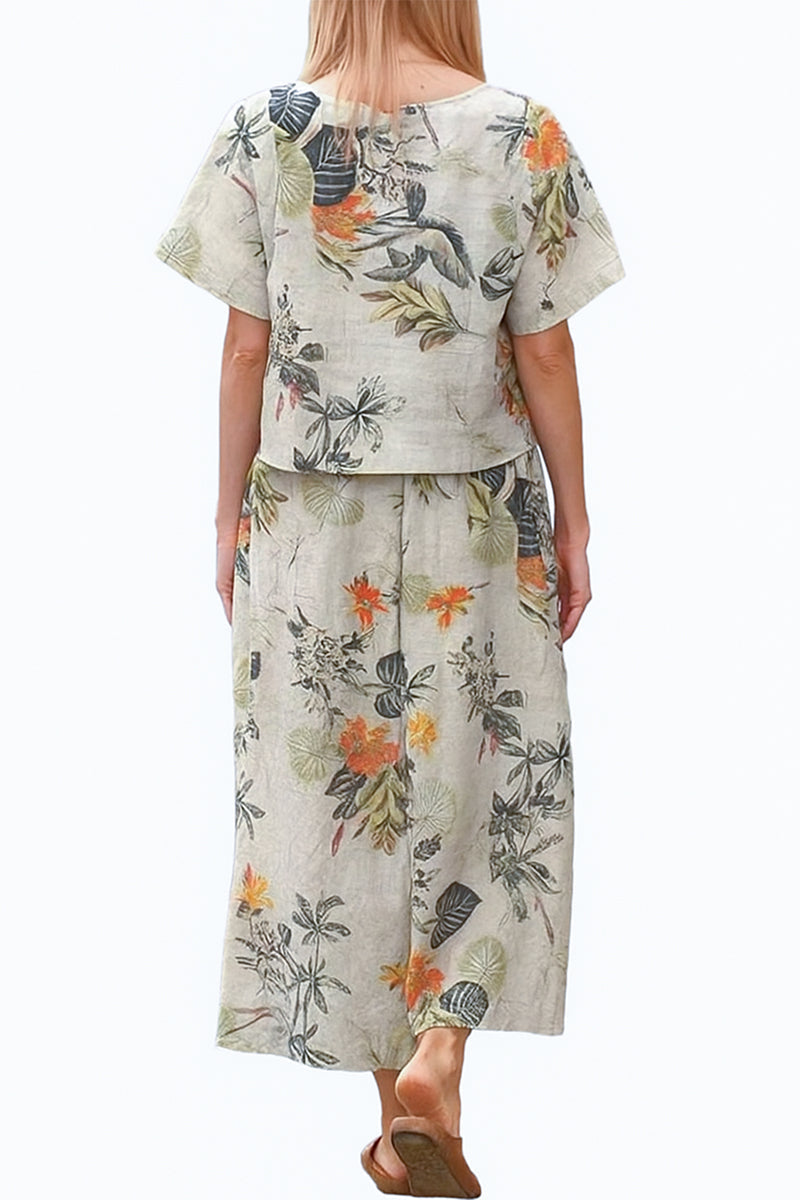 woman wearing Breezy Meadow Two-Piece Set with relaxed top and wide-leg trousers in light fabric