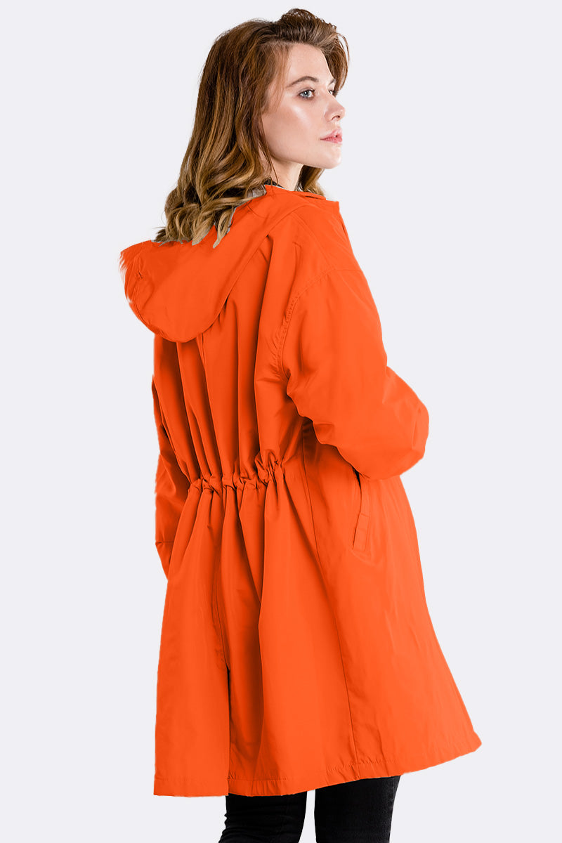Orange oversized water-resistant windbreaker jacket with hood and adjustable waist, rear view.