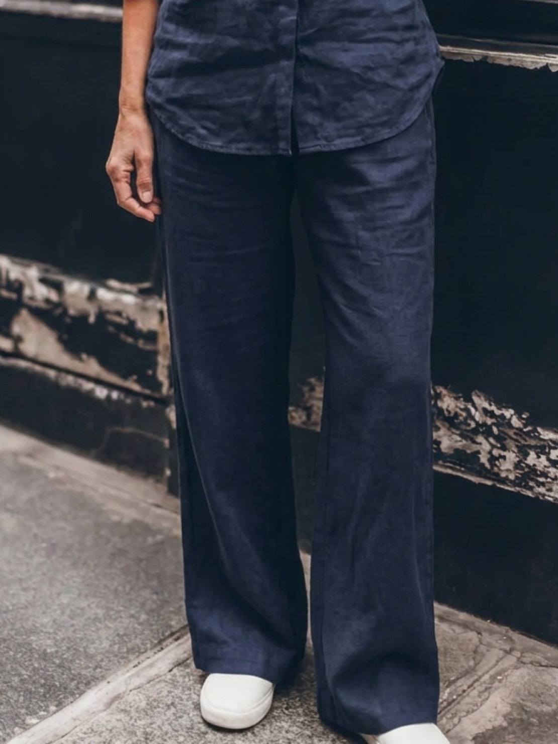 Model wearing oversized 100% cotton shirt and wide-leg pants co-ord set in a relaxed fit