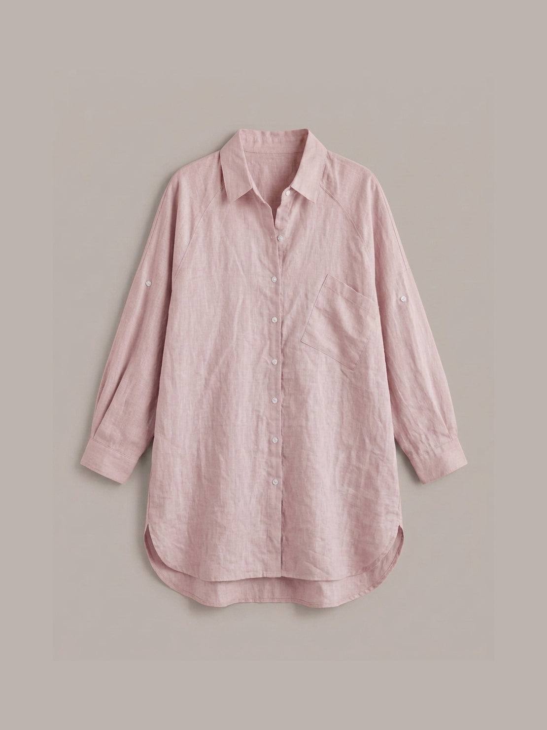 oversized relaxed cotton linen shirt with dropped shoulders and back pleat detail on white background
