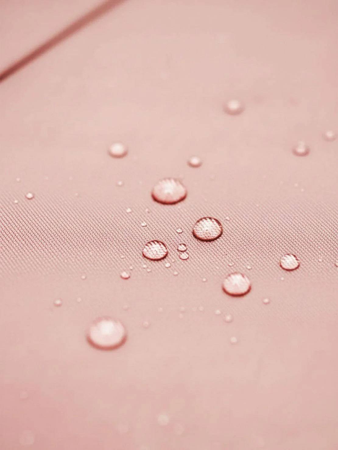 Water-repellent A-line hooded raincoat for women with insulated lining and belt