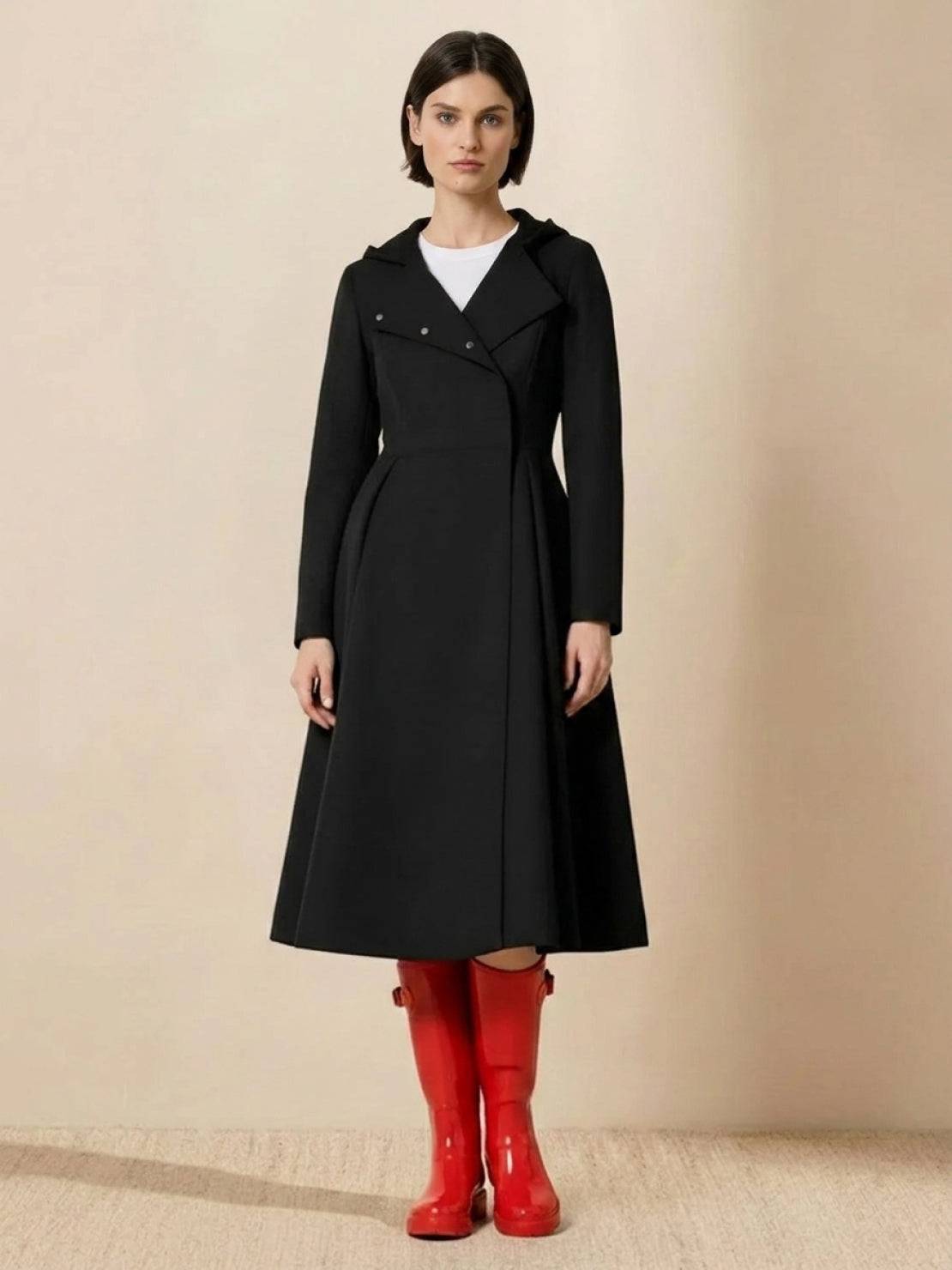 water-repellent A-line hooded raincoat for women with matching belt and insulated lining
