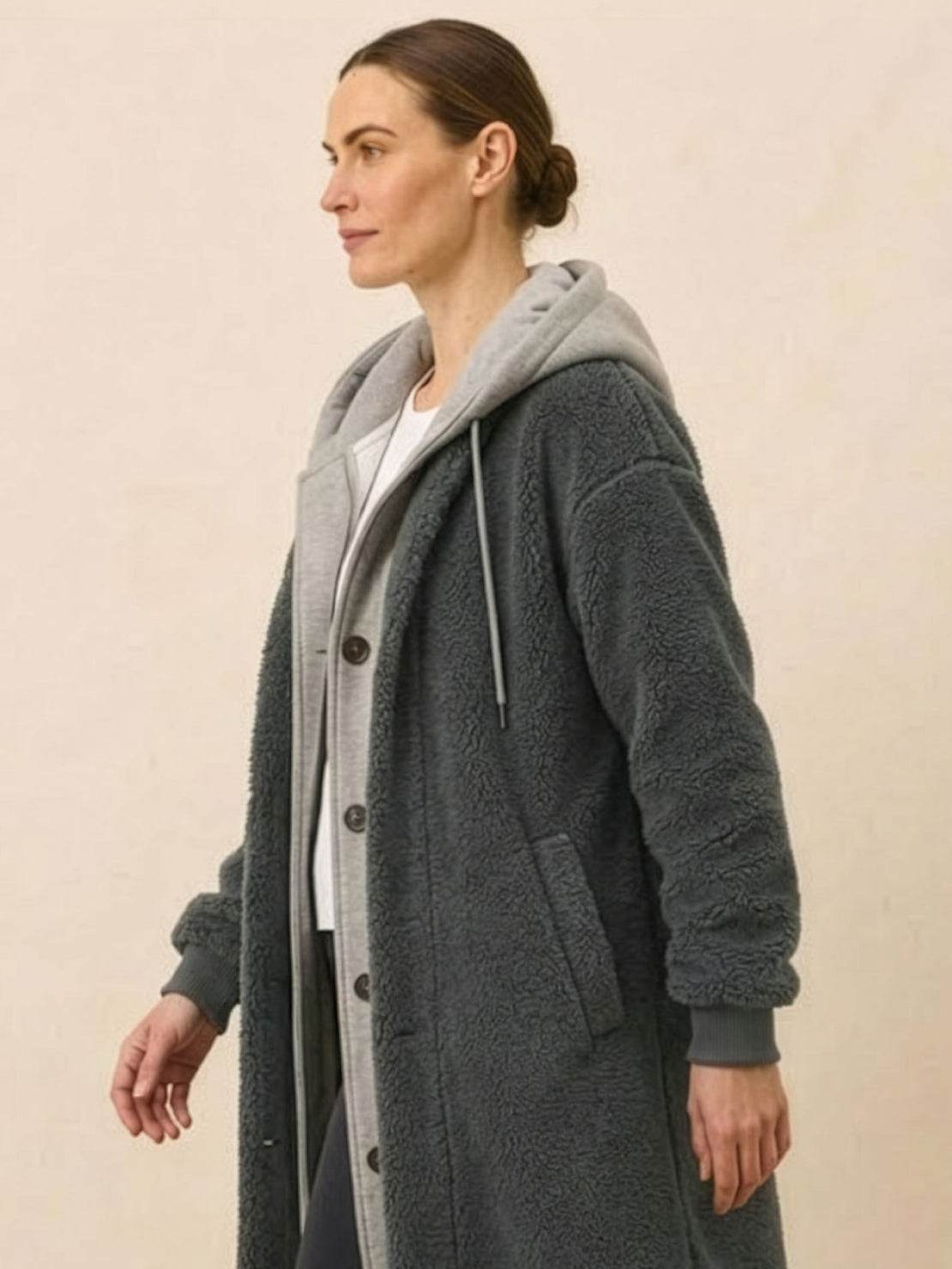Woman wearing cozy oversized sherpa long coat with button closure and hooded sweatshirt underneath Everyday Wear Oversized Coat