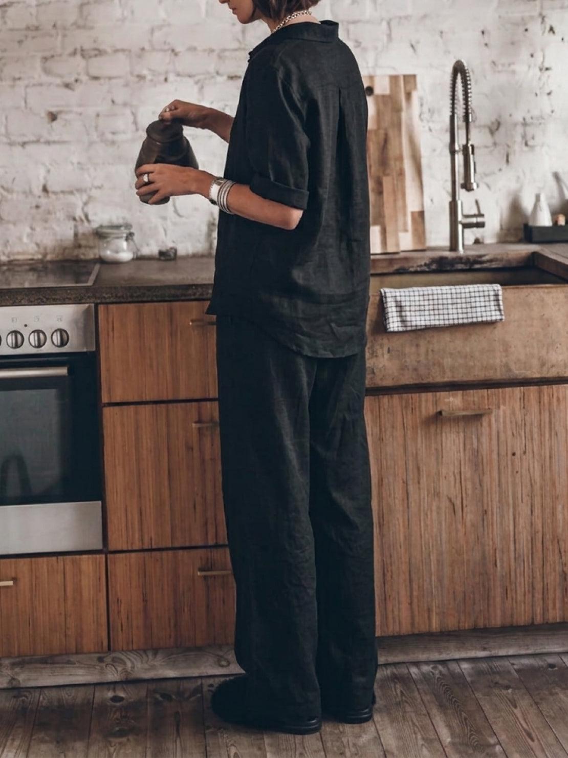 woman wearing oversized 100 cotton shirt and wide-leg pants co-ord set standing outdoors