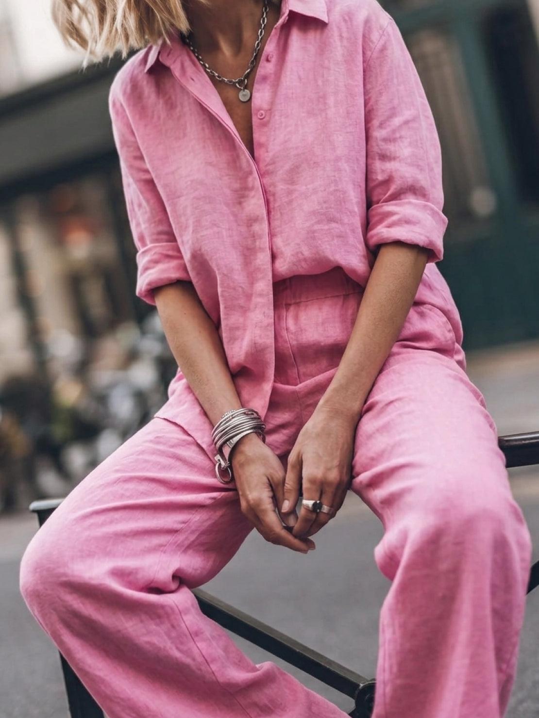 Woman wearing an oversized 100% cotton shirt and wide-leg pants co-ord set in a relaxed, breathable style