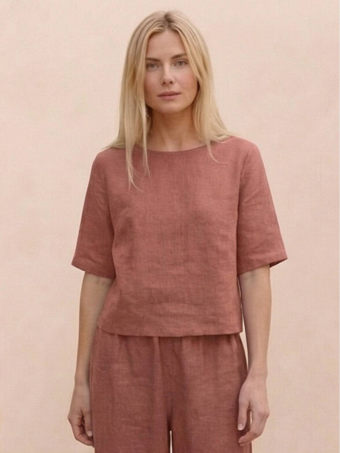 Loose fit co-ord set with soft-tailored top and wide-leg bottoms in breathable cotton blend fabric.