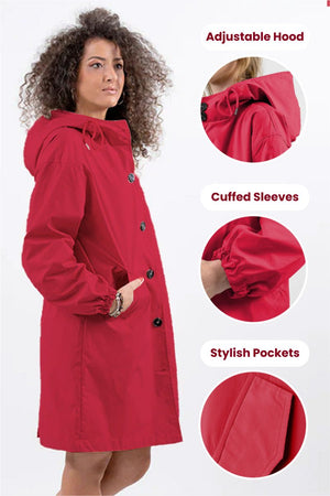 Woman wearing red Rain Couture Windbreaker with adjustable hood, cuffed sleeves, and stylish pockets