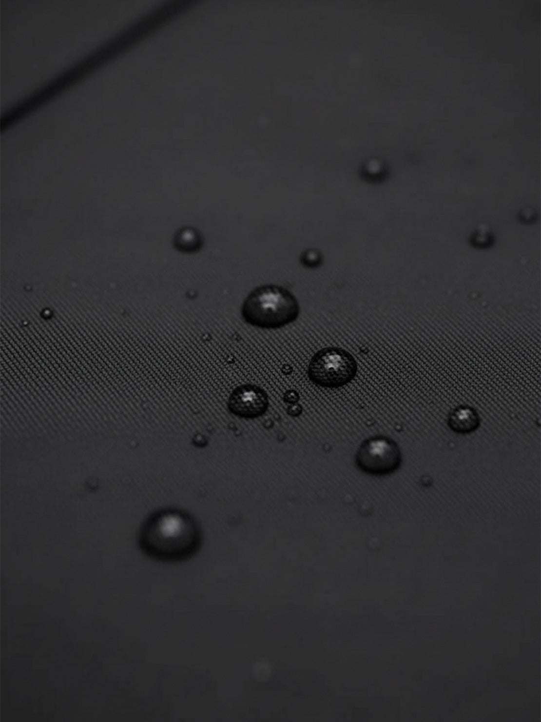 Women’s water-repellent A-line hooded raincoat with belt and insulated lining