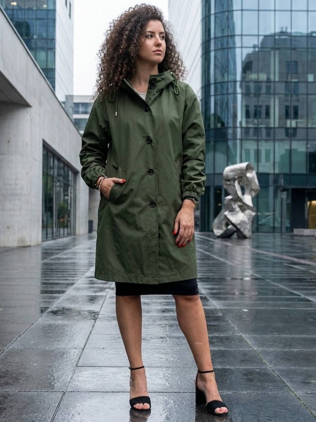 Water-Resistant oversized windbreaker rain jacket with hood and multiple pockets for outdoor activities