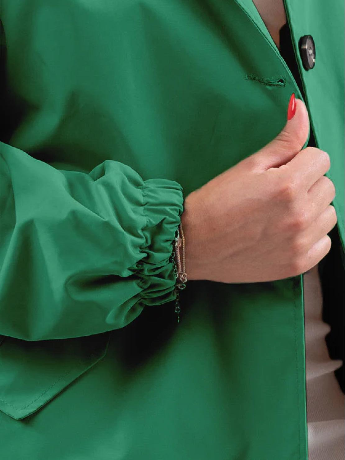 water-resistant oversized hooded windbreaker rain jacket with pockets for outdoor activities