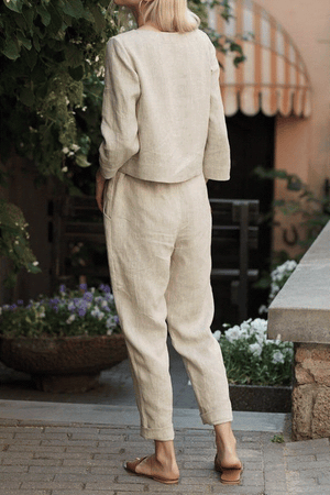 Woman wearing beige 100% cotton linen monochrome two-piece set outdoors