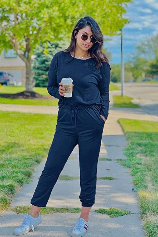 Cozy Chic Two-Piece Sweatsuit Set featuring lightweight long-sleeve top and high-waisted pants with pockets for comfortable travel and casual wear