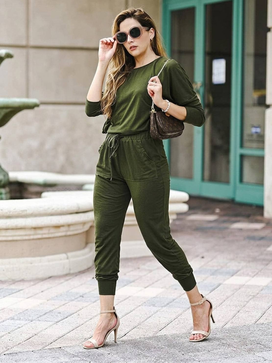 woman wearing Cozy Chic Two-Piece Sweatsuit set with long-sleeve top and high-waisted pants with pockets